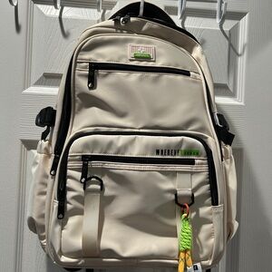 Cream Backpack with Black Accents